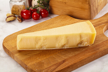 Hard parmesan cheese piece triangle