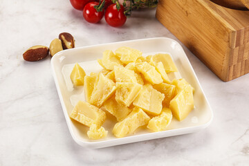 Crushed parmesan cheese in the bowl