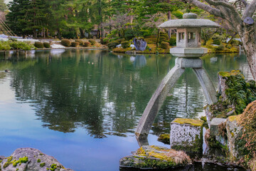 Fototapeta premium Japanese Stone Lantern in a pond