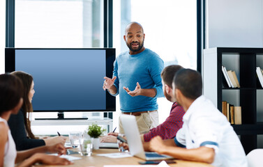 Discussion, businessman and leadership in office for presentation or seminar for meeting with mockup. Training, planning and people in workplace for teamwork and brainstorming for strategy or growth