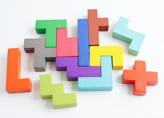 Logical thinking and problem solving problem solution creative business concept, wooden puzzle geometric block shape.