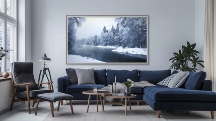 A Scandinavian living room with a dark blue sofa, a recliner chair, and a large, framed print of a serene, snowy landscape