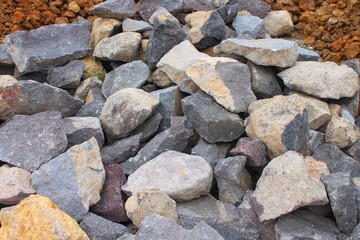 Piles of gravel limestone rock on construction site