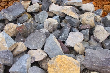 Piles of gravel limestone rock on construction site