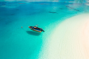 Summer seascape beautiful waves, blue sea water in sunny day. Speedboat floating from drone. Sea...