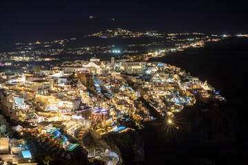 Santorini - Greece - May 17, 2024: Night landscape of Fira village, Santorini, Cycladic Islands,...