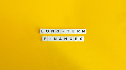 Long-term Finances Banner and Concept Image. Text on Block Letter Tiles.