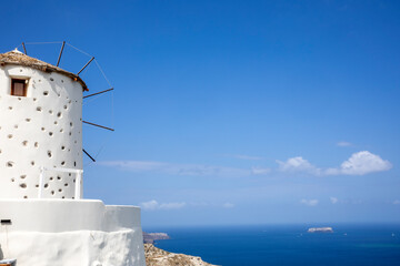 Santorini - Greece - May 17, 2024: An hold windmill, Santorini, Cycladic Islands, Greece.