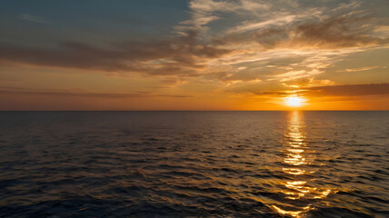 Obraz premium sunset over a serene ocean