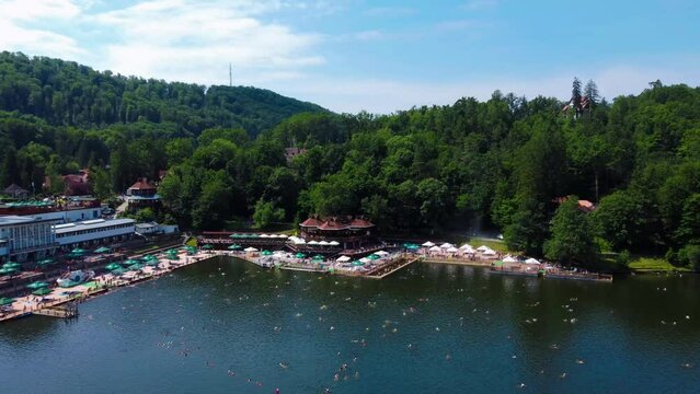 Aerial footage of Lake Ursu (Bear lake) from Sovata resort - Romania