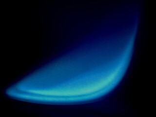 Abstract blurred background texture with blue colors and with curved layers shape texture with black background 