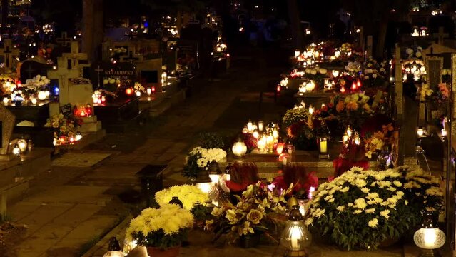 ZAMOSC, POLAND - NOVEMBER 1 2017: Cemetery Roman Catholic with lighted lanterns memorial on the Polish holiday All Saints Day.