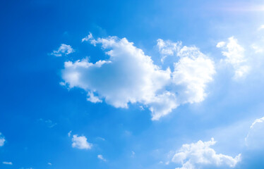 white fluffys clouds sky background with blue sky background for copy space.