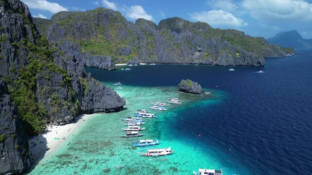 Aerial view of the moored boats off the shore of Shimizu Island in El Nido, Palawan, Philippines