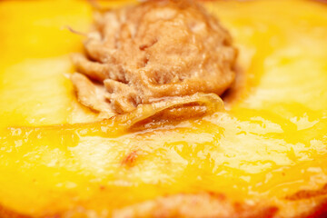 Peach texture. Peach pulp with seed. Selective focus