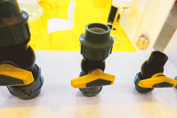 Plastic tap with hose connectors.