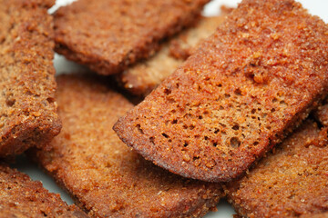 ried pieces of bread close-up. Selective focus