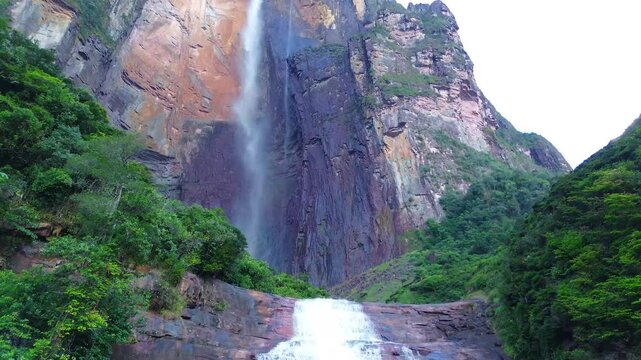 Angel Falls captivates visitors with its sheer vertical drop and the misty spray that envelops the surrounding lush landscape.