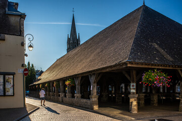 Historic Les Halles Marketplace in Questembert, Brittany France at Sunset