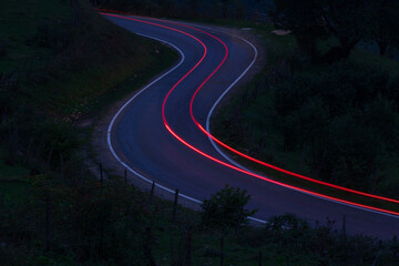 Vehicle headlights light line on the winding road, Süllü, Giresun, Türkiye