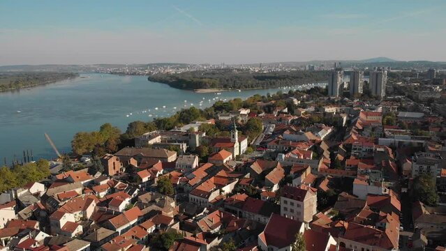 Establishing ascending shot aerial view of Belgrade city from Zemun in Serbia.