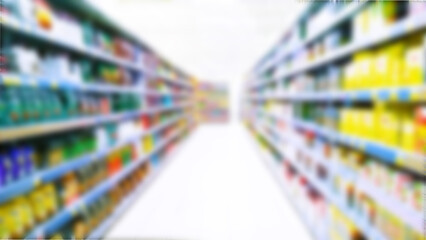 Abstract blur image of supermarket background. Defocused shelves with products. Grocery store. Retail industry. Discount. Inflation and recession concept. Aisle. Consumer packaged goods. CPG. Rack.