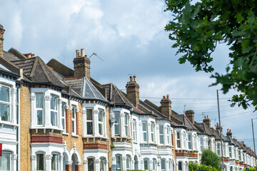 UK- Row of typical brick terraced houses in Wimbledon, south west London