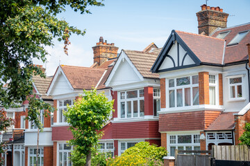 UK- Row of typical brick terraced houses in Wimbledon, south west London