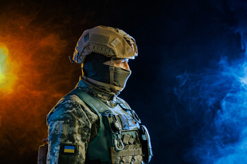 Portrait of a Tactical Soldier in Combat Gear against an Intense Orange and Blue Background