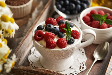 A cup of cottage cheese blended with flax seed oil with fresh berries
