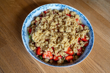 Crumb dough over bits of strawberry and rhubarb