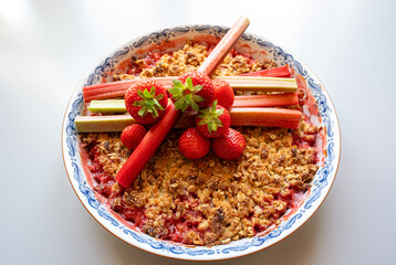 Fresh fruits on baked fruit pie with crumb dough
