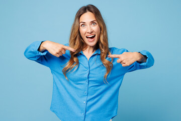 Young surprised excited shocked woman she wear shirt casual clothes point index fingers on herself...