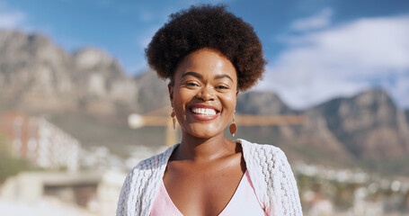 Black woman, portrait and happy at beach for holiday, break and fresh air on day off in Atlanta. Smile, outdoor and confident in seaside on vacation as traveler on tour, trip and journey to explore