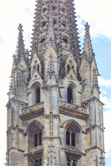 Obraz premium Bell tower of the Basilica of Saint-Michel from Bordeaux France. La Fleche Saint Michel, cathedral spire in Gothic style. Windows are small and the building is very old