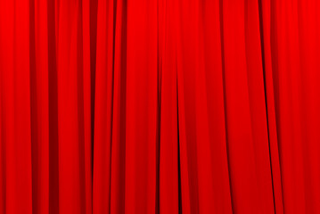 red theater curtain that dropped down as a straight line. Background for inserting text, empty spaces.	