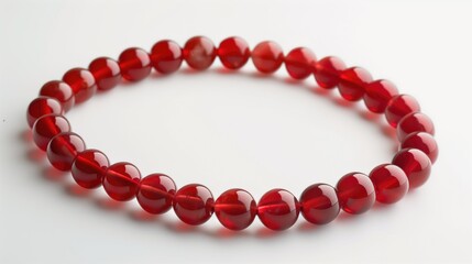 Obraz premium Red precious stone beads necklace or bracelet isolated on white background