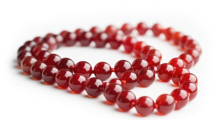 Red precious stone beads necklace or bracelet isolated on white background