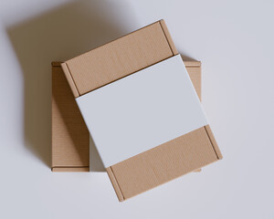 Brown cardboard  boxes with a label white color isolated on gray background