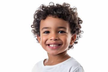 Charming Brazilian preschool-aged boy with an enthusiastic expression, facing the camera, isolated on white background.