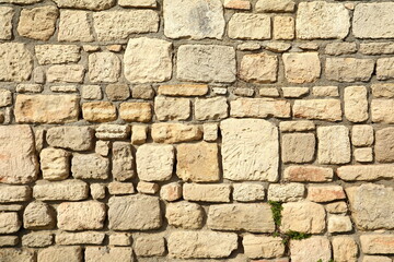 Antique natural stonewall. pattern of modern style design decorative uneven cracked real stone wall surface with cement