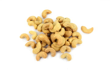 Unshelled roasted cashew nuts isolated on white background