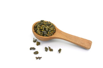 Chinese traditional jasmine teain a spoon isolated on white. Chinese culture. Dried Jasmine oolong tea.