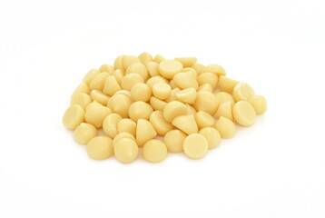 Organic cocoa butter buttons (wafers) isolated on white background