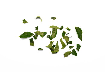 Chopped curry leaves (Murraya koenigii) isolated on white background