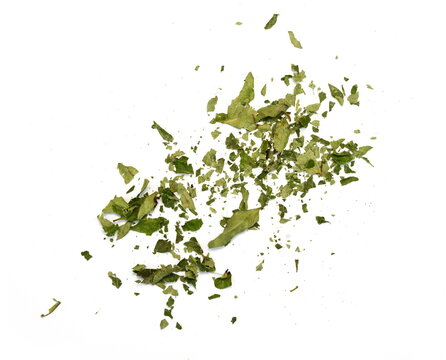 Dried curry leaves isolated on white background. Karivepaku or karuveppilai podi. Karapincha chips. curry leaves chips, coarse cuts. 