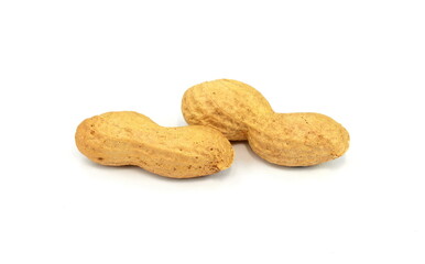 Organic peanuts in shell, isolated on white background. Raw peanuts on a white background. Unshelled peanuts.