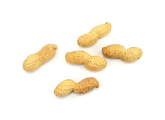 Organic peanuts in shell, isolated on white background. Raw peanuts on a white background. Unshelled peanuts.