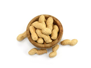 Organic peanuts in shell, isolated on white background. Raw peanuts on a white background. Unshelled peanuts.