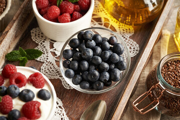 Blueberries with cottage cheese, flax seed oil and fresh raspberries. Budwig diet.
